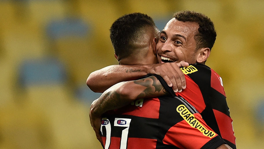 RIO DE JANEIRO, BRAZIL - AUGUST 12: Alan Patrick (R) and Kayke of Flamengo celebrate the victory against Atletico Paranaense during a match between Flamengo and Atletico Paranaense as part of Brasileirao Series A 2015 at Maracana Stadium on on August 12, 2015 in Rio de Janeiro, Brazil. (Photo by Buda Mendes/Getty Images)